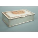 An electroplate table cigarette box bearing an engraved presentation inscription "Col R S
