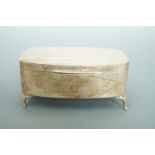 An Edwardian silver bijouterie / trinket box, of rounded rectangular section, raised over four feet,