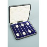 A cased set of six George V silver coffee spoons, with coffee bean terminals, Hulkin & Heath,
