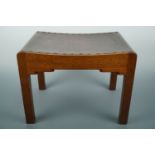 An Arthur Simpson Kendal Arts and Crafts oak stool with hide seat, 40 cm x 30 cm x 31 cm high