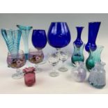 Two small studio glass vases together with various blue glass vases etc.