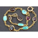 A yellow metal mounted turquoise cabochon and facet-cut garnet bracelet, 20 cm