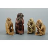 A graded group of four carved soapstone monkeys, tallest 4.5 cm