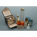 A 1920s cased Art Deco influenced perfume atomizer together with sundry perfume and other bottles