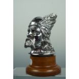 A Rover Cars Viking head car mascot on turned wooden socle, 12 cm