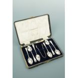 A cased set of six George VI silver Old English pattern coffee spoons and sugar tongs, W M Co,