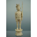 An early 19th Century Anglo-Indian carved model of a Sepoy, 9 cm