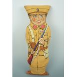 A printed fabric doll modelled as a Great War soldier