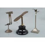 Three pre-War shop display shoe stands