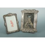 A Belle Epoque Art Nouveau silver photograph frame and one other Edwardian silver frame, former 20