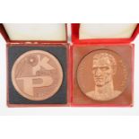 Two Polish bronze mining medallions, cased, 8 cm, circa 1970s