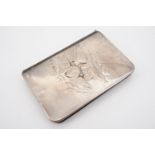 An Edwardian silver-faced alphabetised address book, decorated in a relief depiction of putti,