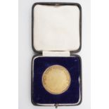 A cased 1930s silver gilt Daily Record medal, 38 mm