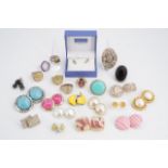 A quantity of vintage costume jewellery statement earrings and dress rings etc