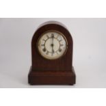 A mahogany mantle clock, 29 cm high