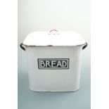 A vintage enamel bread bin