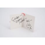An autograph gift tag from Eric Clapton to a member of his management