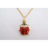 An enamelled 18 ct gold pendant in the form of a ladybird, on a fine link neck chain, 13 mm