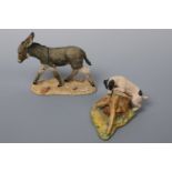 Two Border Fine Art figurines; Jack Russell Chasing a Rabbit and A Donkey