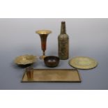 A quantity of Indian and oriental brass trays etc