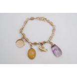 A 9 ct gold charm bracelet with amethyst and other charms, 13.4 g