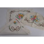 A 1920s tea cloth set including tea table cover, tea tray liner and tea pot cover, each in a