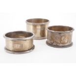 Three various silver napkin rings