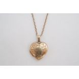 A 9 ct gold heart-shaped double locket, on fine link yellow metal neck chain, 4.3 g