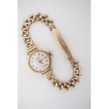 A 1950s lady's H&G 9 ct gold cased wristlet watch on rolled gold bracelet strap