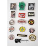 A quantity of "heavy metal" lapel badges including AC/DC, Motorhead, Saxon etc, circa 1980s