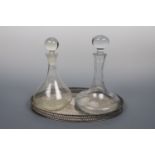A Rodney / ship's decanter, one other decanter and an electroplate galleried tray