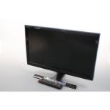 A Samsung TV and monitor 21 screen with remote control