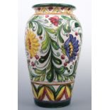 A large Italian Sgraffito decorated majolica oviform vase, 47 cm high