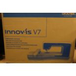 A boxed Innov-IS V7 embroidery machine and accessories