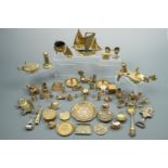 A large quantity of brass miniature novelties etc