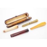 Gold collared meerschaum, amber and other cigarette / cheroot holders and a case for such