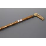 A horn handled walking cane