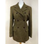 A vintage herringbone wool walking suit, comprising a double-breasted jacket and skirt, skirt