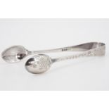 A late Victorian set of silver sugar tongs, engraved in a Rococo pattern, Sheffield, 1899, 23 g
