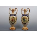 A pair of Edwardian vases, transfer printed and hand tinted with sentimental vignettes, 46 cm