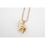 A yellow metal pendant modelled as an elephant, on a 9 ct gold box link neck chain, 6.7 g