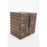 A Huntley and Palmers novelty biscuit tin modelled as a bound stack of books, 16 x 12 x 16.5 cm