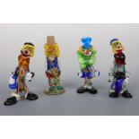 Four studio glass clowns, tallest 22 cm