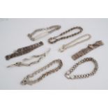 A quantity of gate link and other silver / white metal bracelets, 103 g
