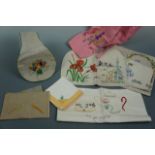 Vintage hand-embroidered novelties including a handbag, a pink linen apron and a tea pot cover