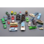 A small collection of unboxed die-cast toy vehicles, including a Corgi Toys Austin A60, Lesney