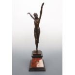 A quality reproduction Chiparus bronzed figure modelled as an exotic dancer, on marble plinth, 56