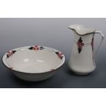 A Burleigh Ware wash jug and basin, the jug of slender form, decorated with a raised floral