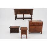 Miniature wooden furniture including a 1920s oak sideboard and bedding chest