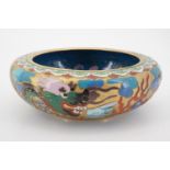 A Chinese cloisonne enamelled bowl decorated with Imperial dragons chasing a pearl, 15 cm
